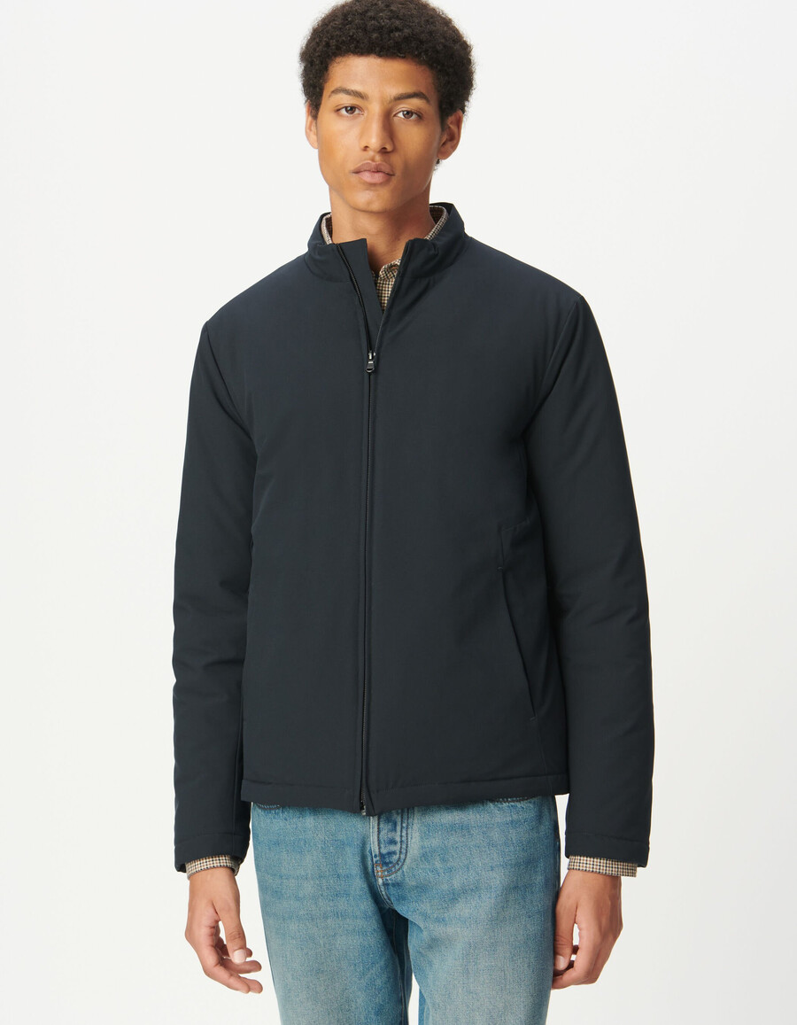 chaqueta acolchada ligera de cuello alto azul marino para hombre