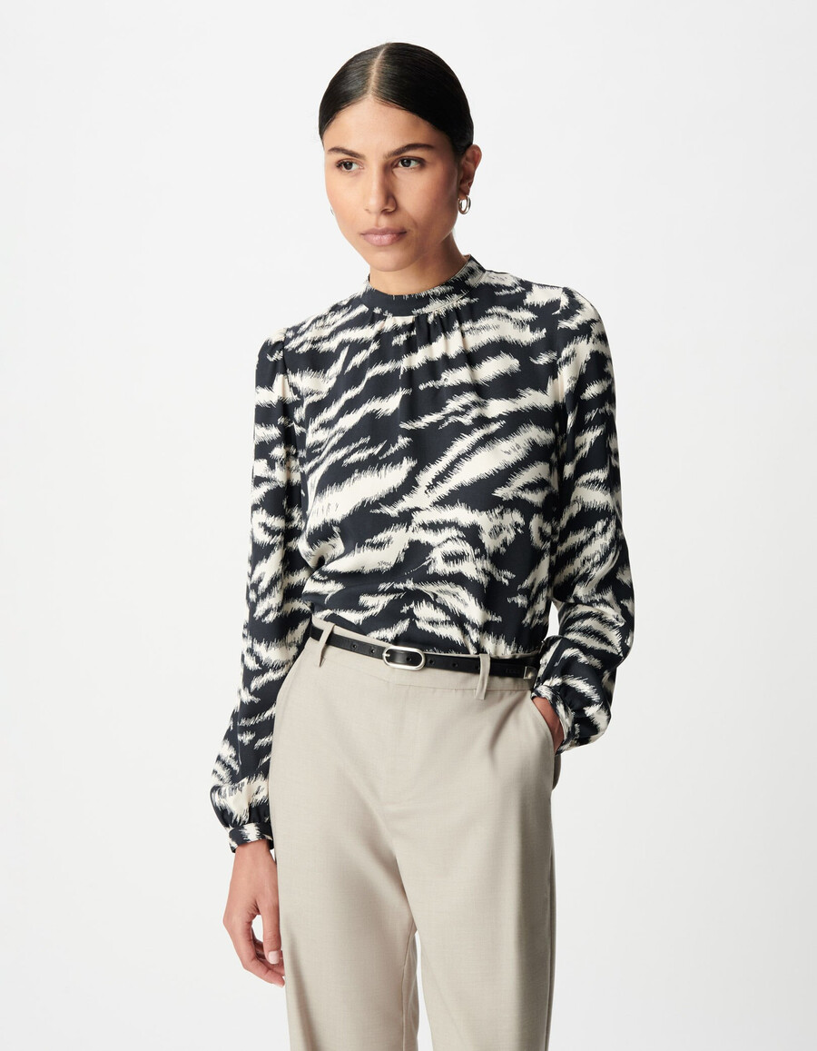 blusa negra con estampado de cebra para mujer