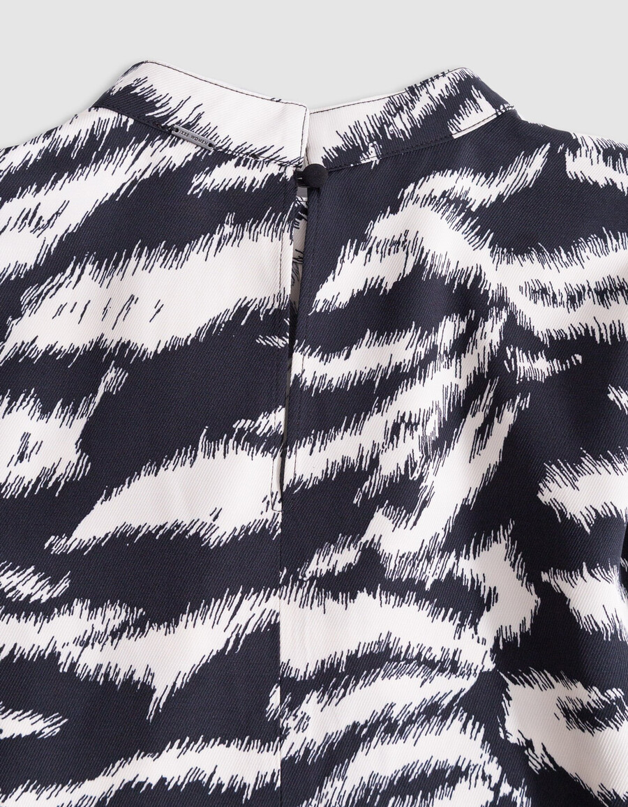 blusa negra con estampado de cebra para mujer