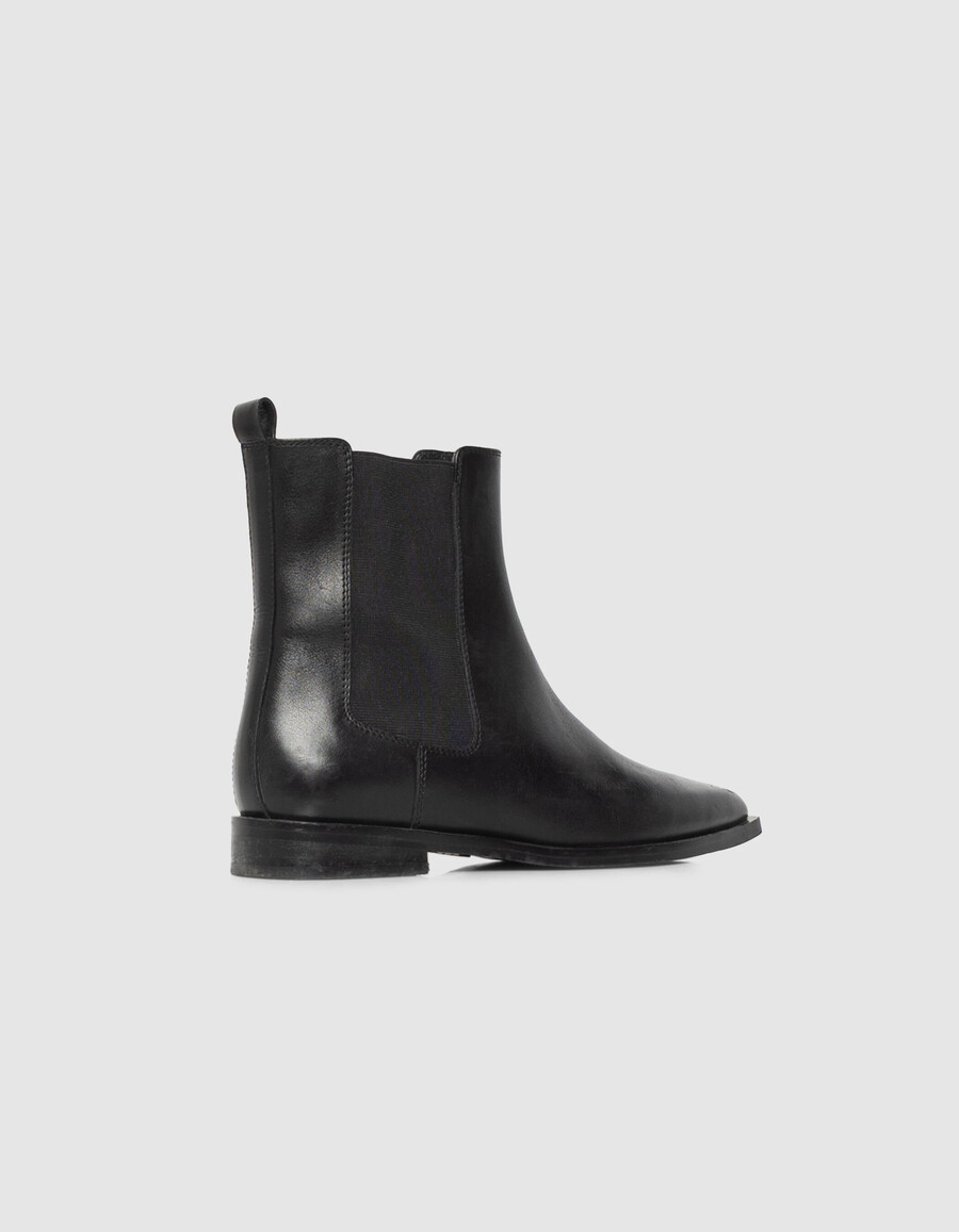 botas chelsea de piel negra con punta puntiaguda para mujer