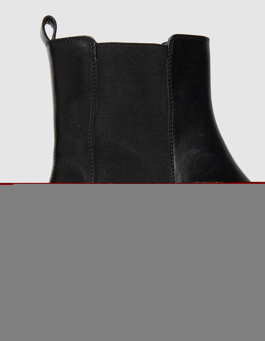 botas chelsea de piel negra con punta puntiaguda para mujer