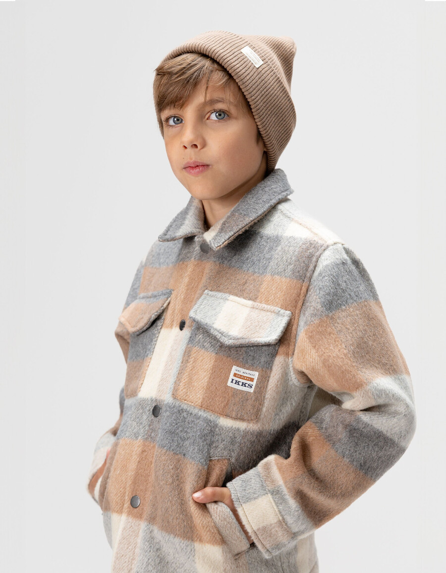 chaqueta de lana a cuadros beige con forro de piel para niño