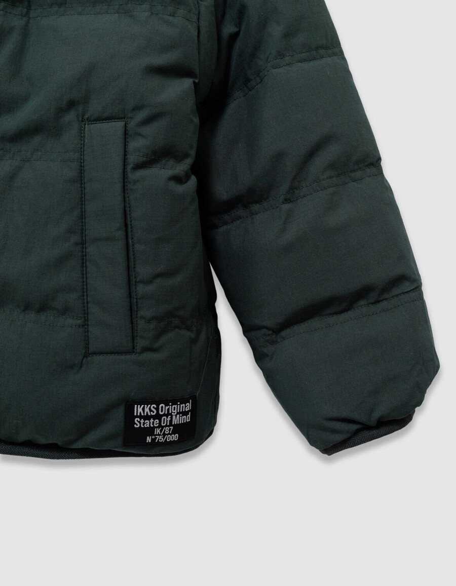chaqueta acolchada reversible de terciopelo verde para niño