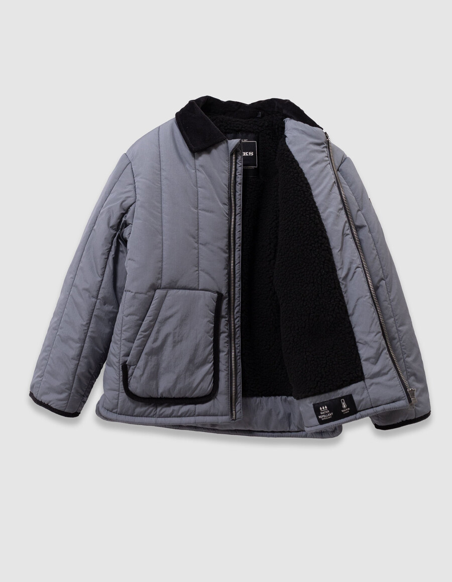 chaqueta acolchada azul para niño con cuello de terciopelo