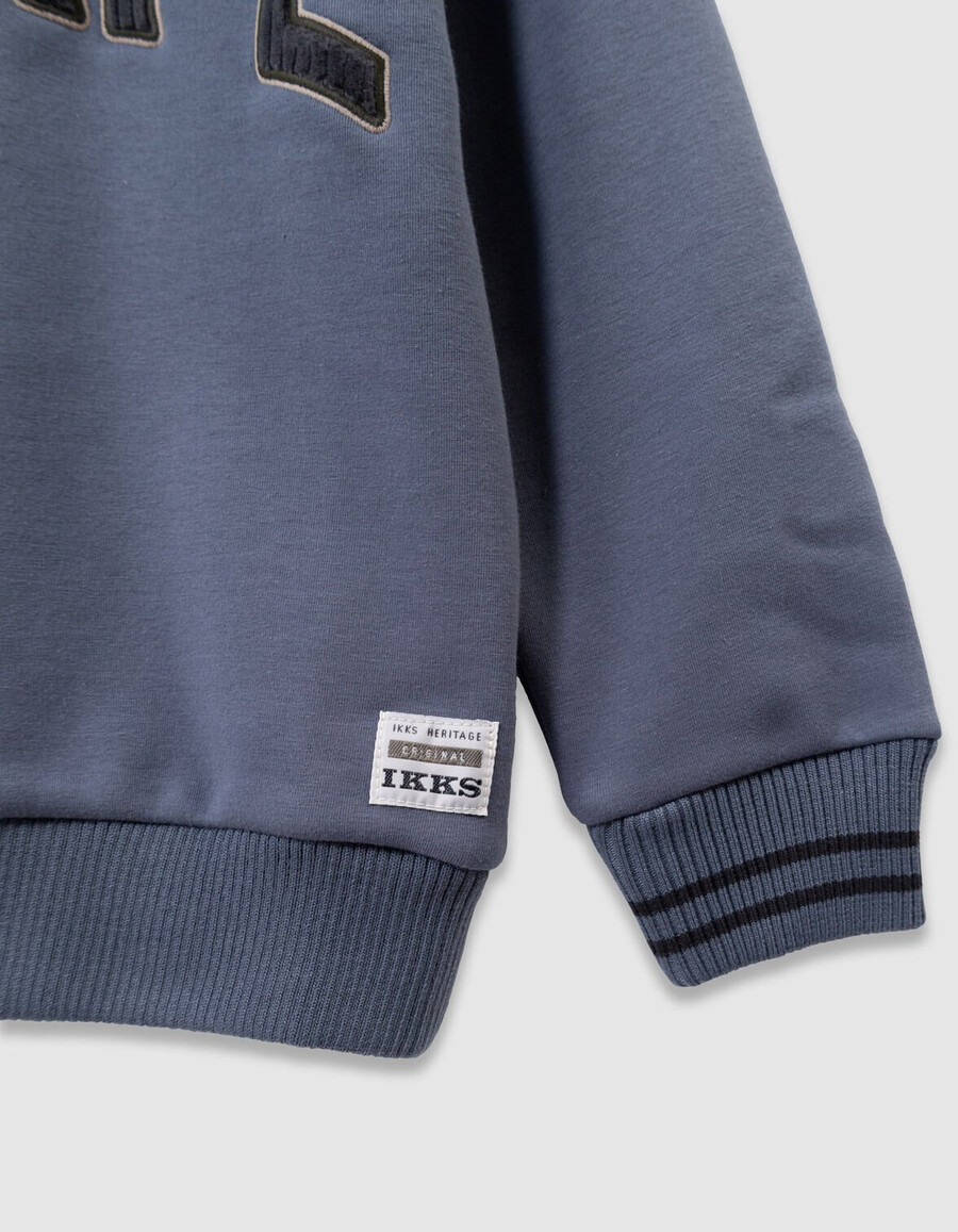 sudadera azul para niño eslogan bordado en pana