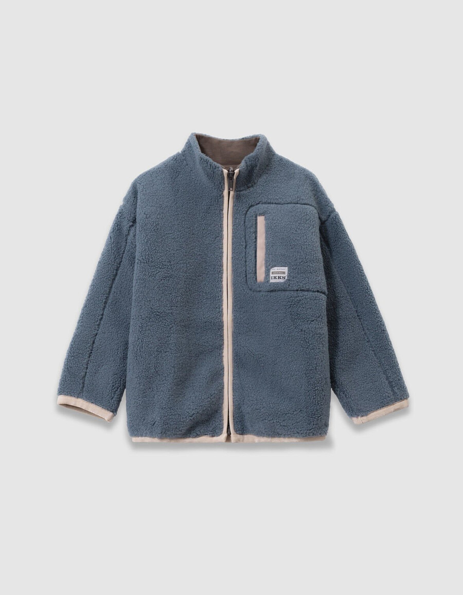 cárdigan reversible de sherpa azul y caqui para niño