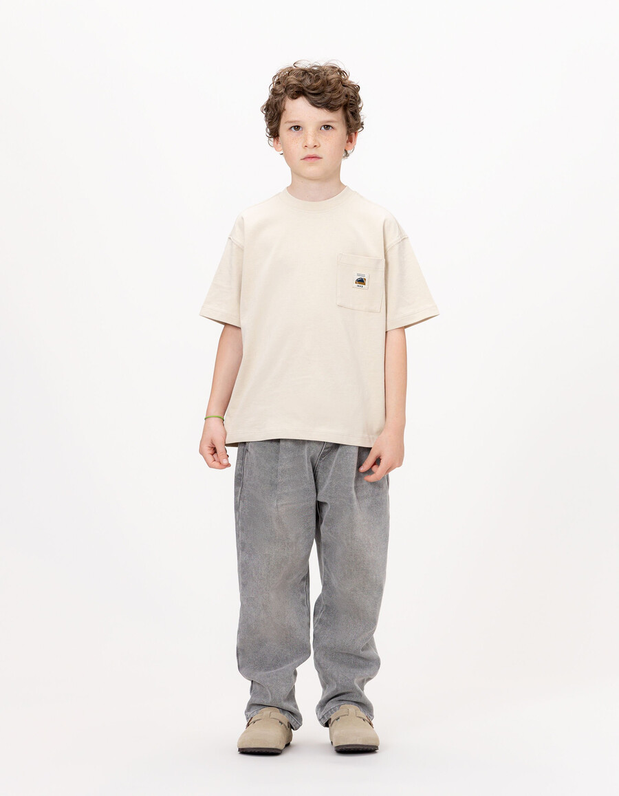 camiseta de algodón orgánico beige para niño bolsillo talla xl imagen trasera