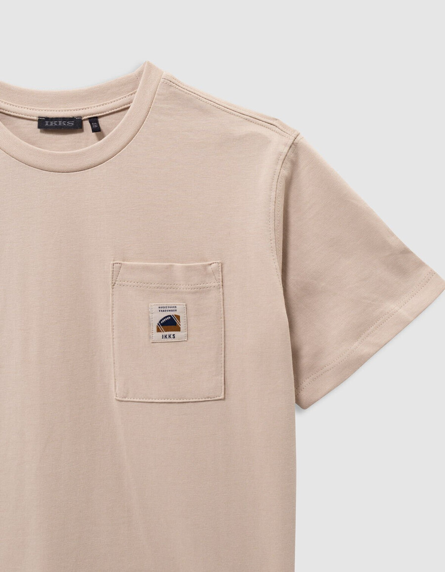 camiseta de algodón orgánico beige para niño bolsillo talla xl imagen trasera