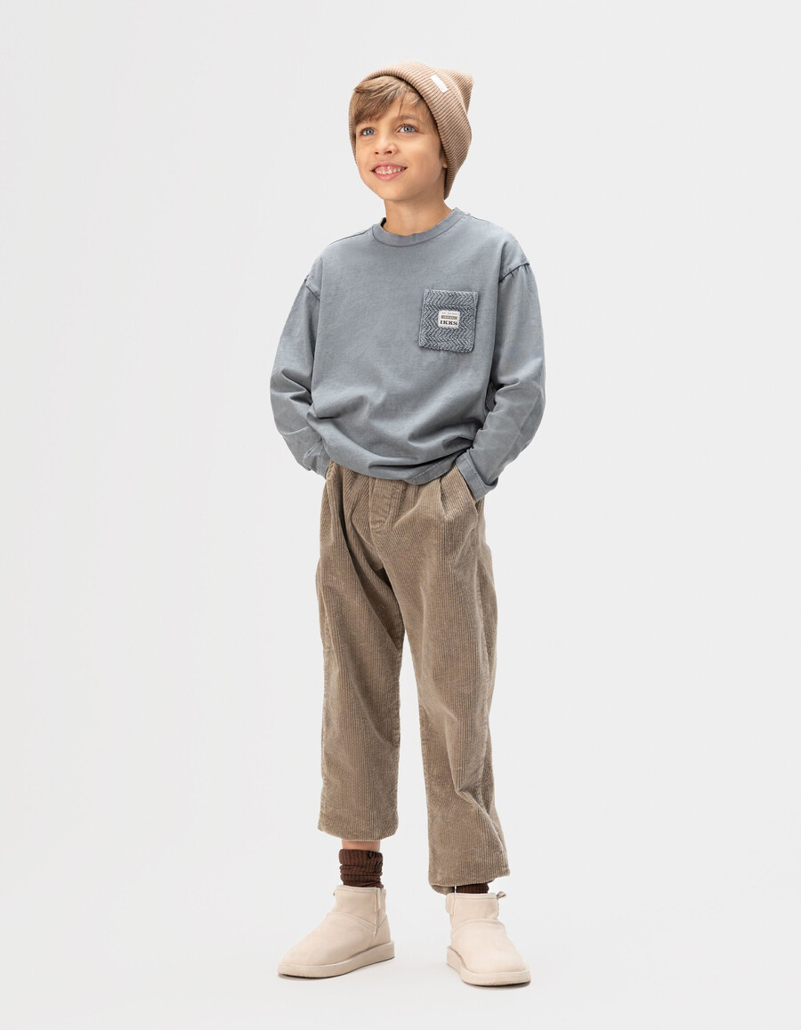 camiseta de manga larga de algodón orgánico azul para niño bolsillo de punto