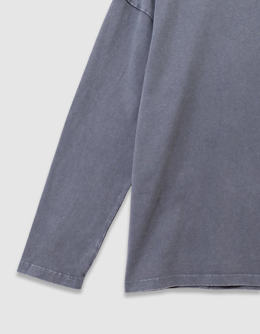 camiseta de manga larga de algodón orgánico azul para niño bolsillo de punto