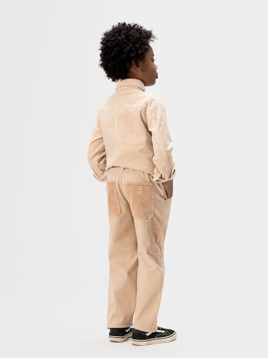 joggers holgados beige con detalles de pana para niño