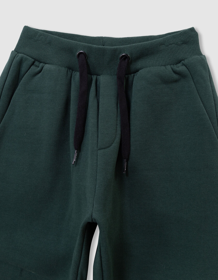 joggers verdes para niño con bolsillo de tejido mixto