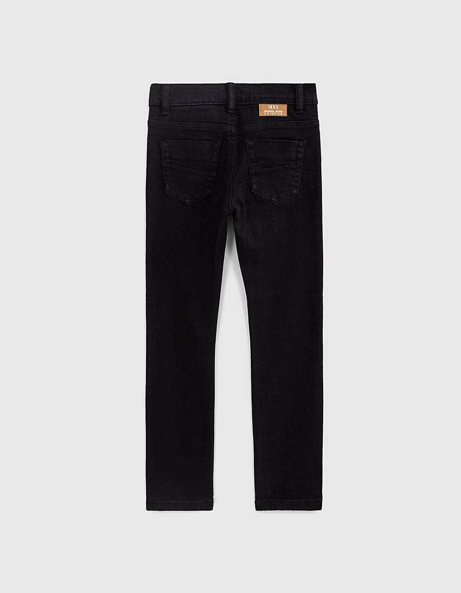 pantalones negros ajustados para niño