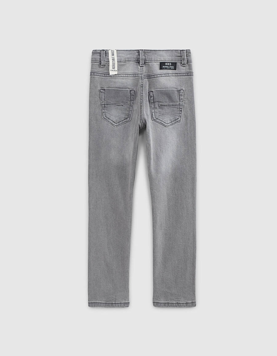 pantalones grises ajustados para niño