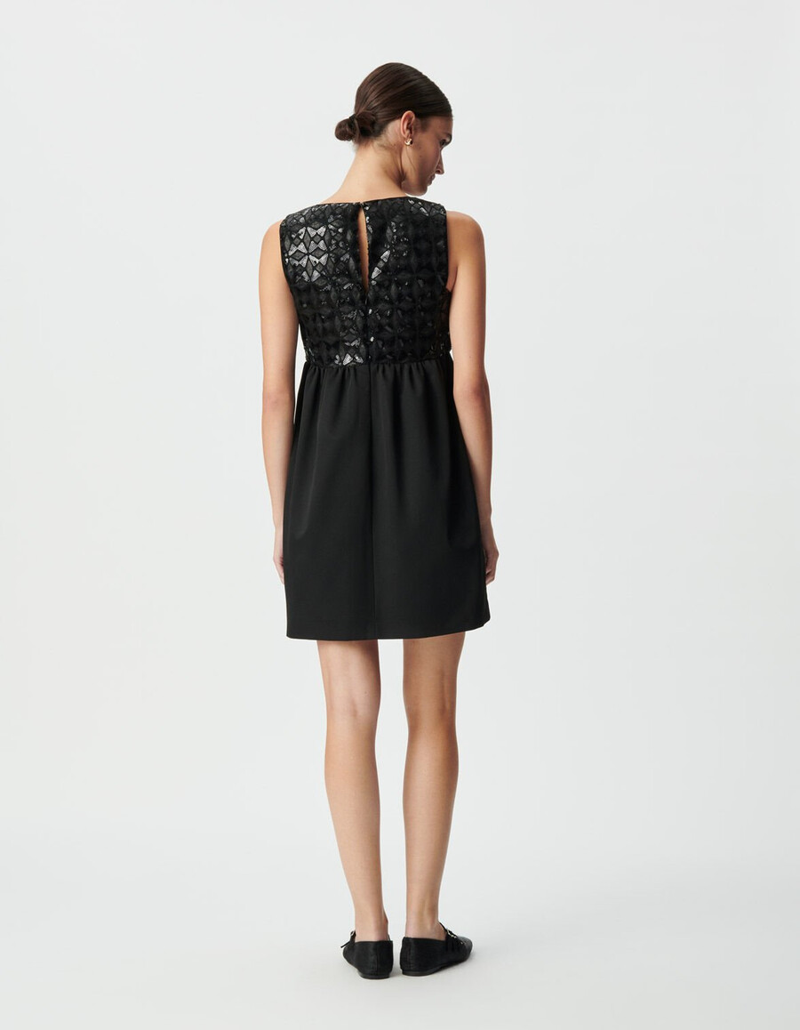 vestido negro de mujer con bordado gráfico de lentejuelas
