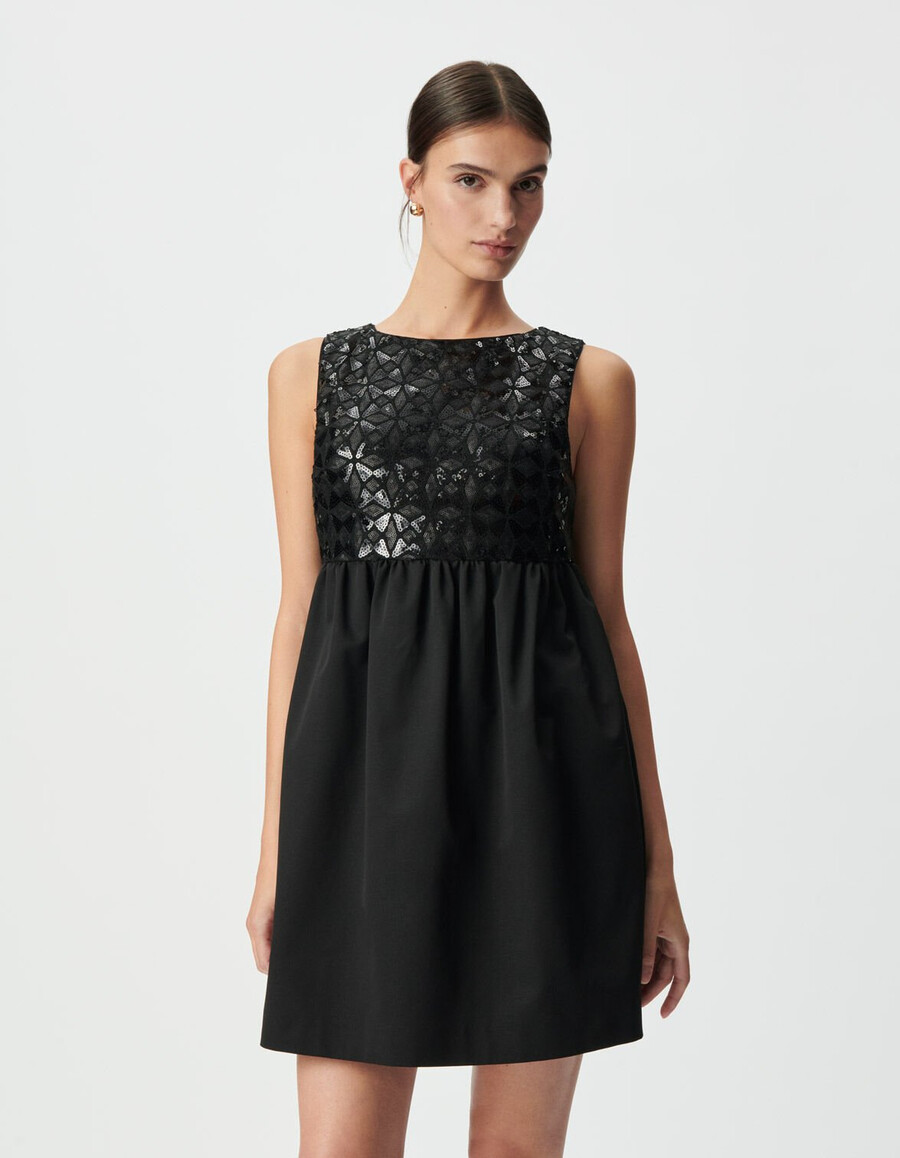 vestido negro de mujer con bordado gráfico de lentejuelas