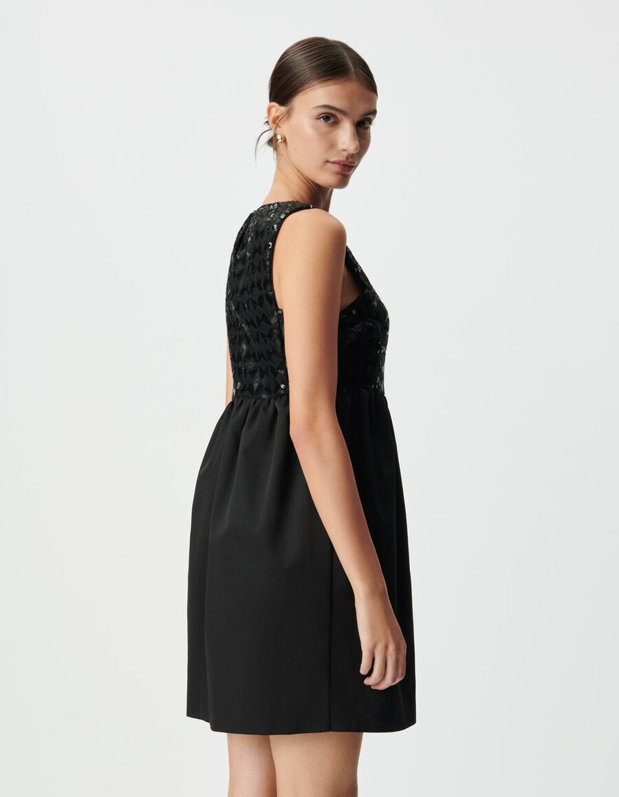 vestido negro de mujer con bordado gráfico de lentejuelas
