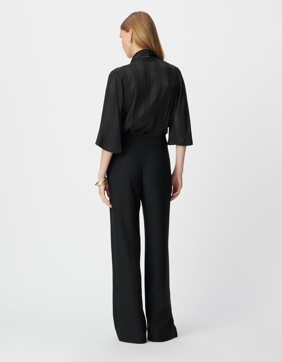 mono negro de tejido mixto con parte superior fluida para mujer
