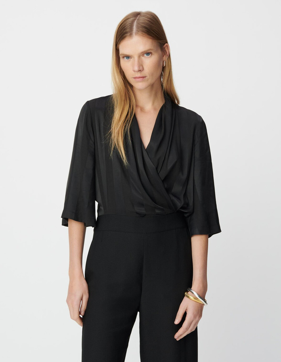 mono negro de tejido mixto con parte superior fluida para mujer