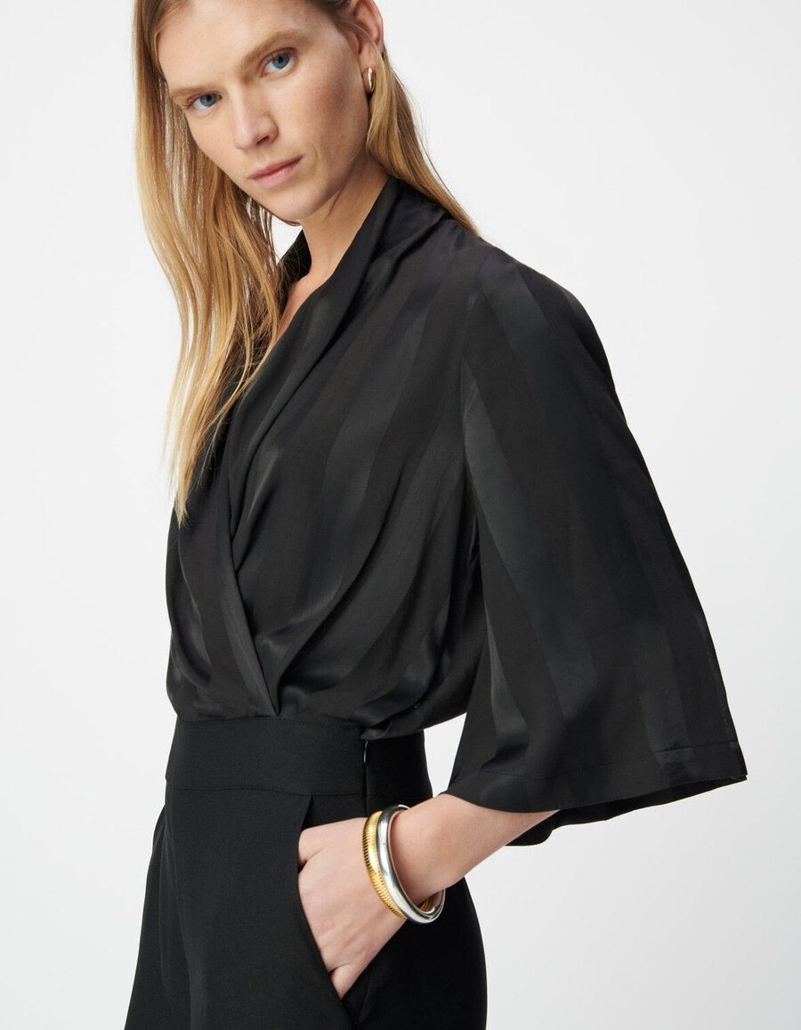 mono negro de tejido mixto con parte superior fluida para mujer
