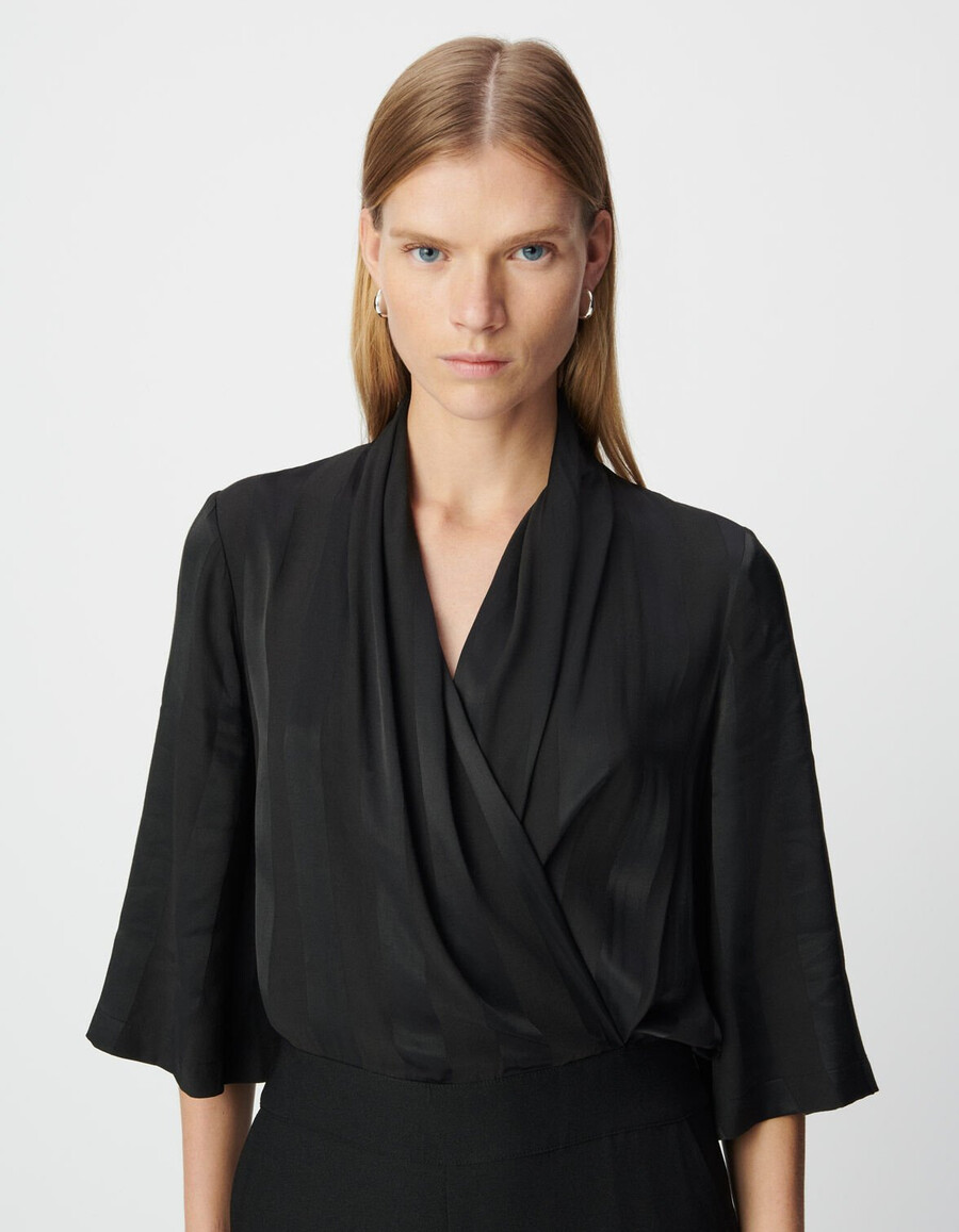 mono negro de tejido mixto con parte superior fluida para mujer