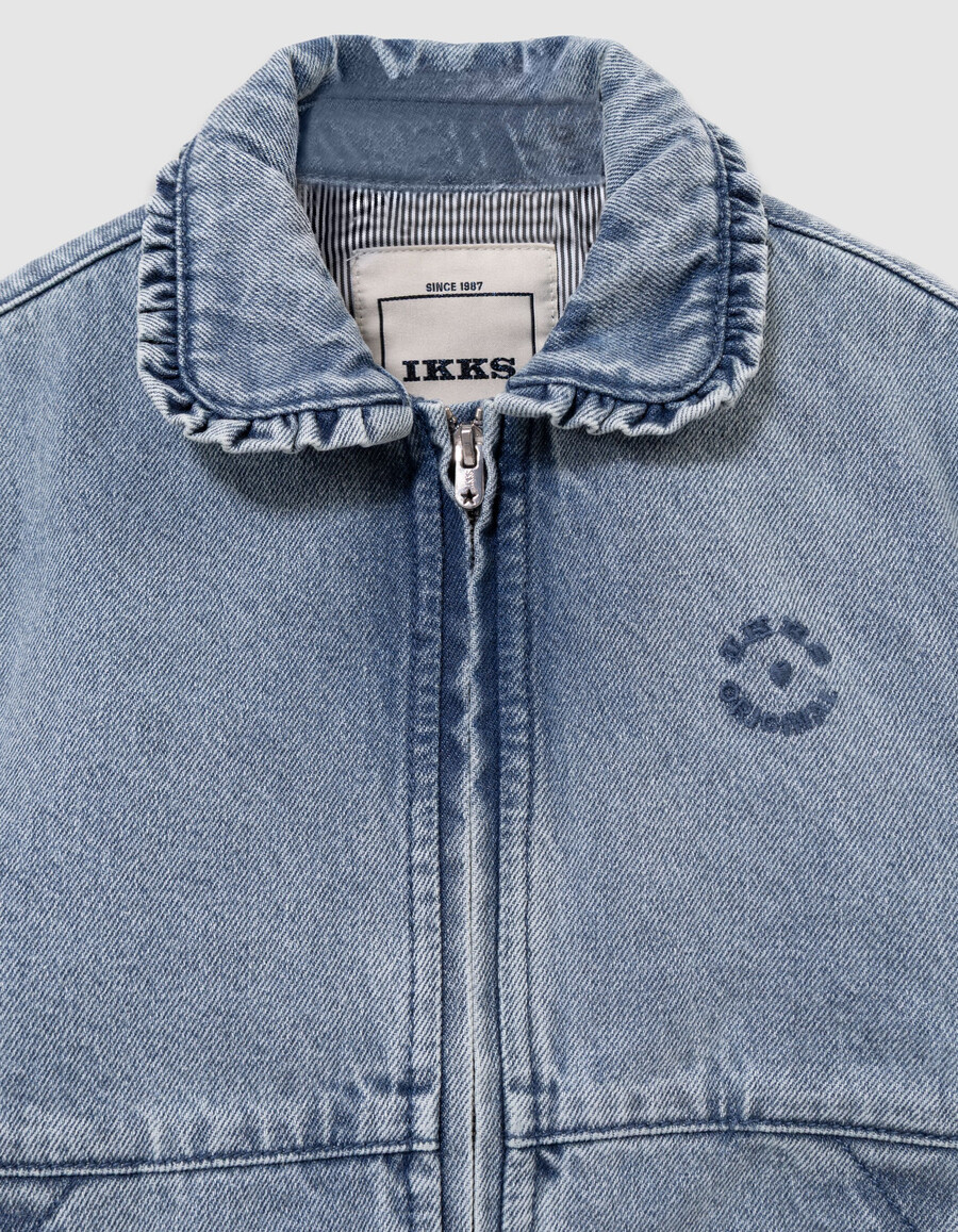 chaqueta vaquera azul para niña con mangas desmontables