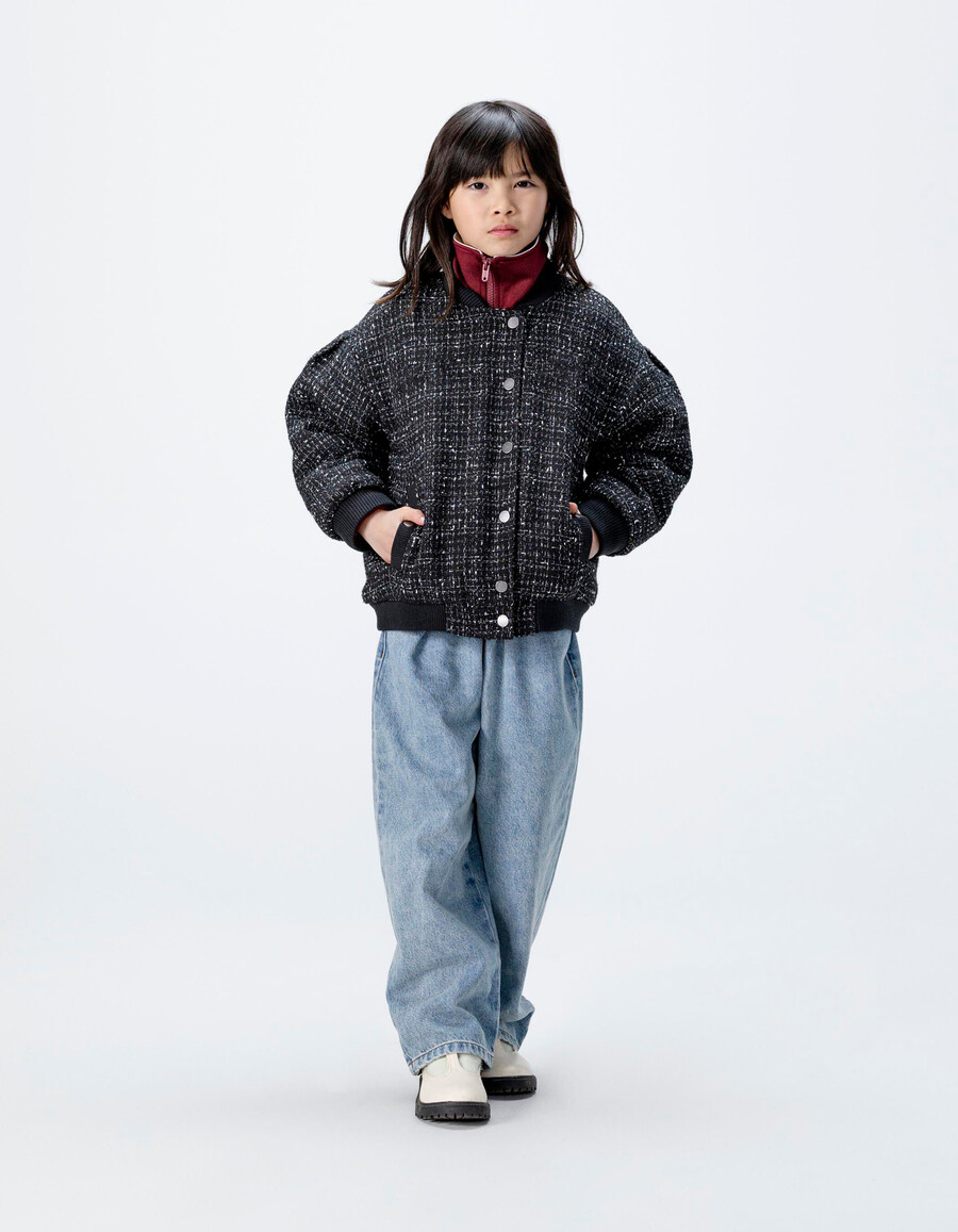 chaqueta negra de efecto tweed para niña
