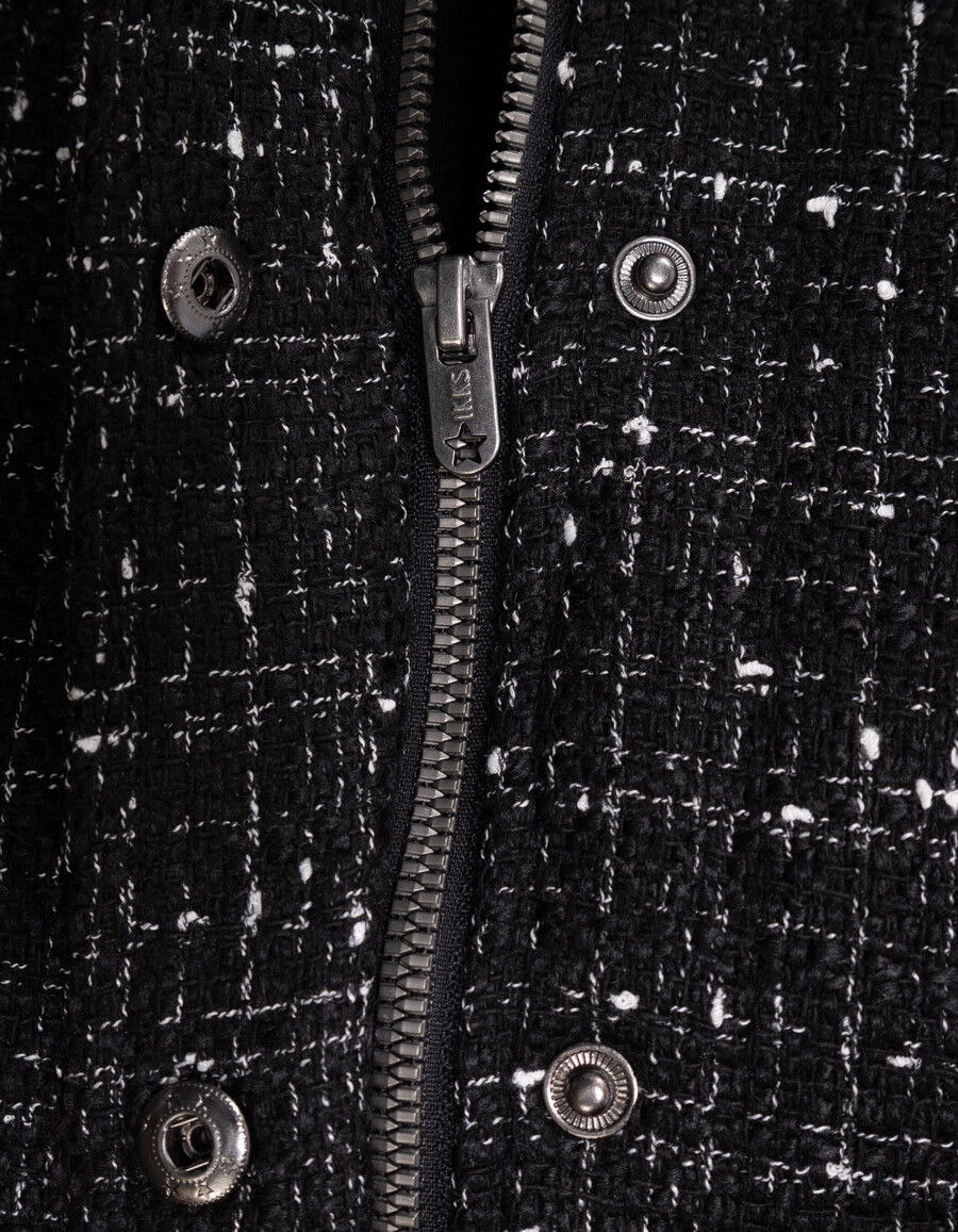 chaqueta negra de efecto tweed para niña