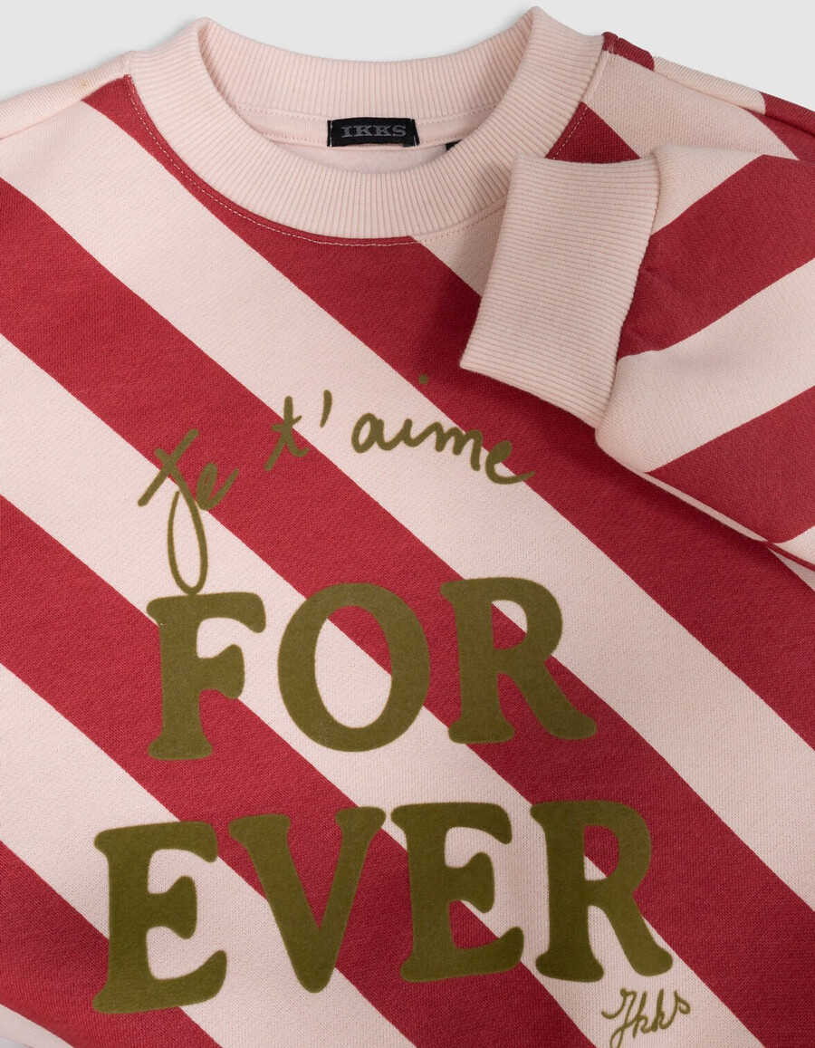 sudadera de niña con rayas rojas y rosas y eslogan