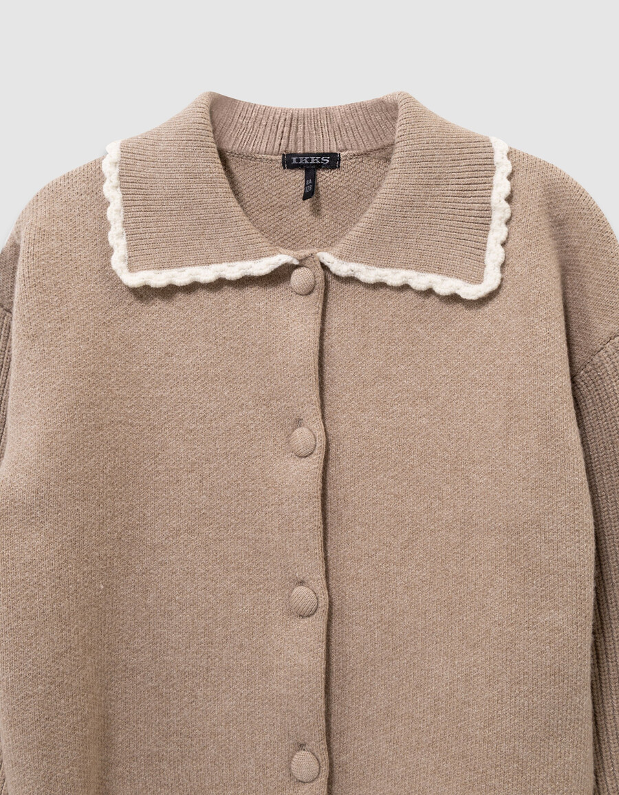 cárdigan de punto beige para niña con mangas acanaladas