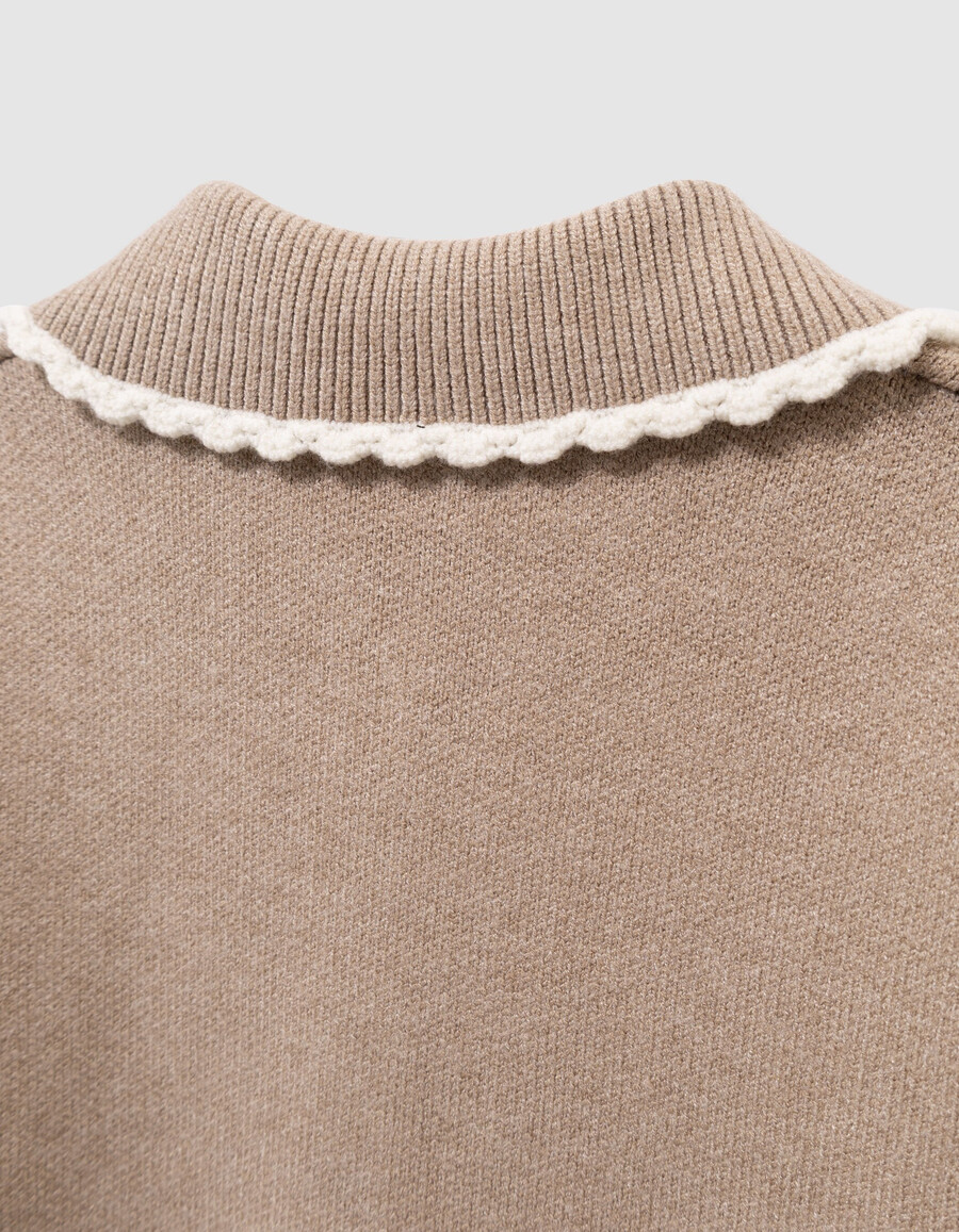 cárdigan de punto beige para niña con mangas acanaladas
