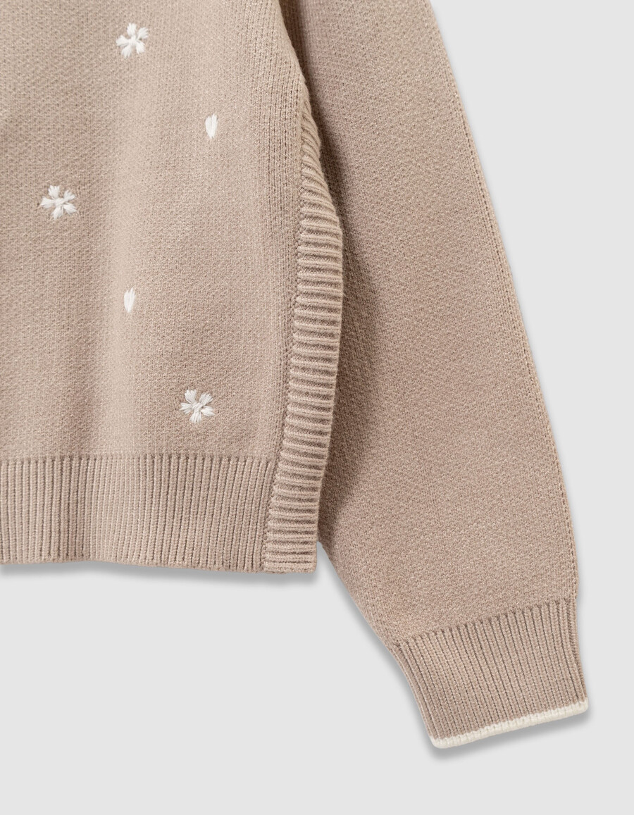 suéter de punto beige para niña con mangas desmontables