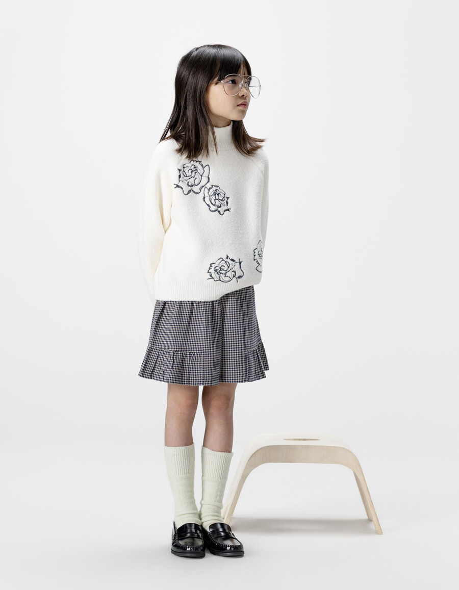 pantalones cortos de cuadros vichy azul marino con volantes para niña