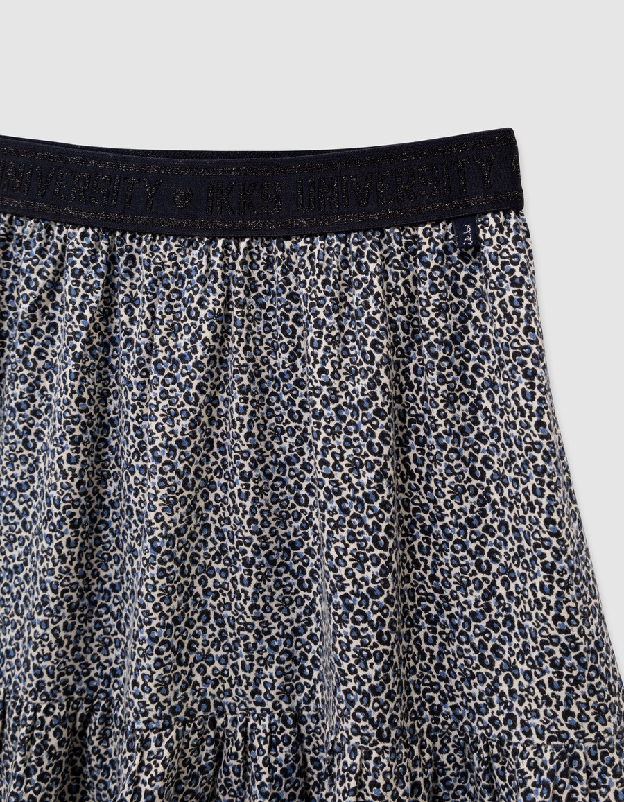 falda corta azul marino para niña con estampado de lazo de leopardo