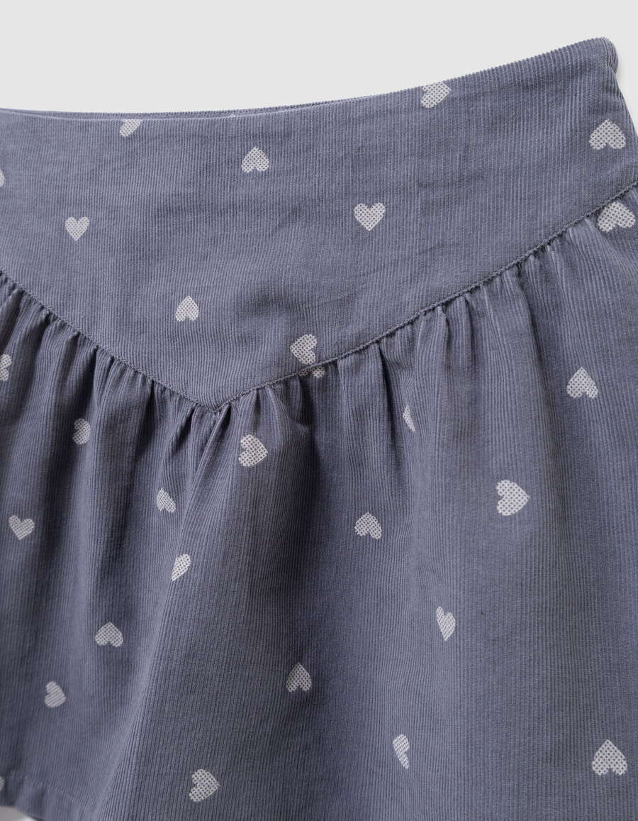 falda corta de terciopelo azul para niña con motivo de corazón
