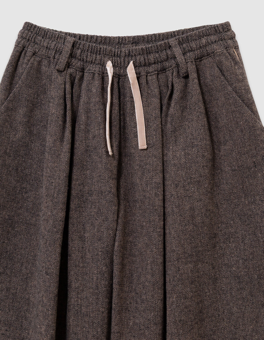 pantalones anchos de franela marrón jaspeada para niña