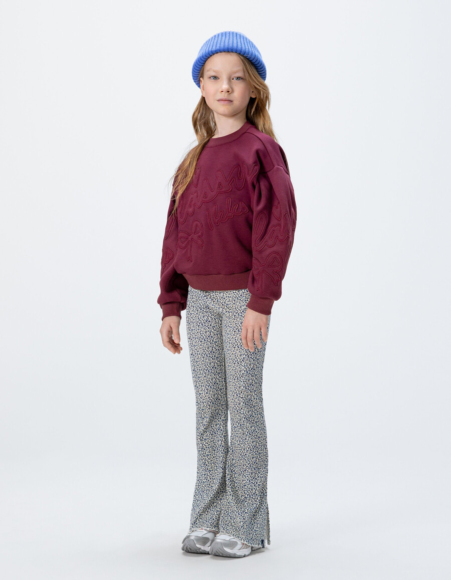 leggings acampanados azul marino para niña con estampado de lazo de leopardo