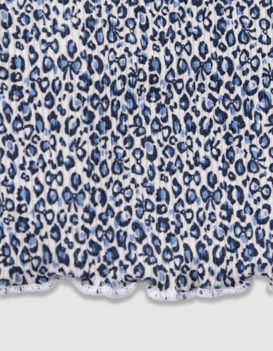 leggings acampanados azul marino para niña con estampado de lazo de leopardo