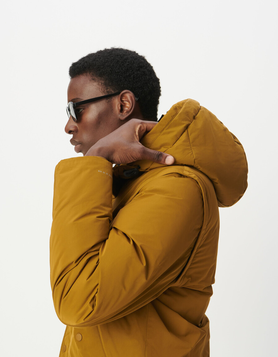 chaqueta acolchada impermeable amarilla para hombre
