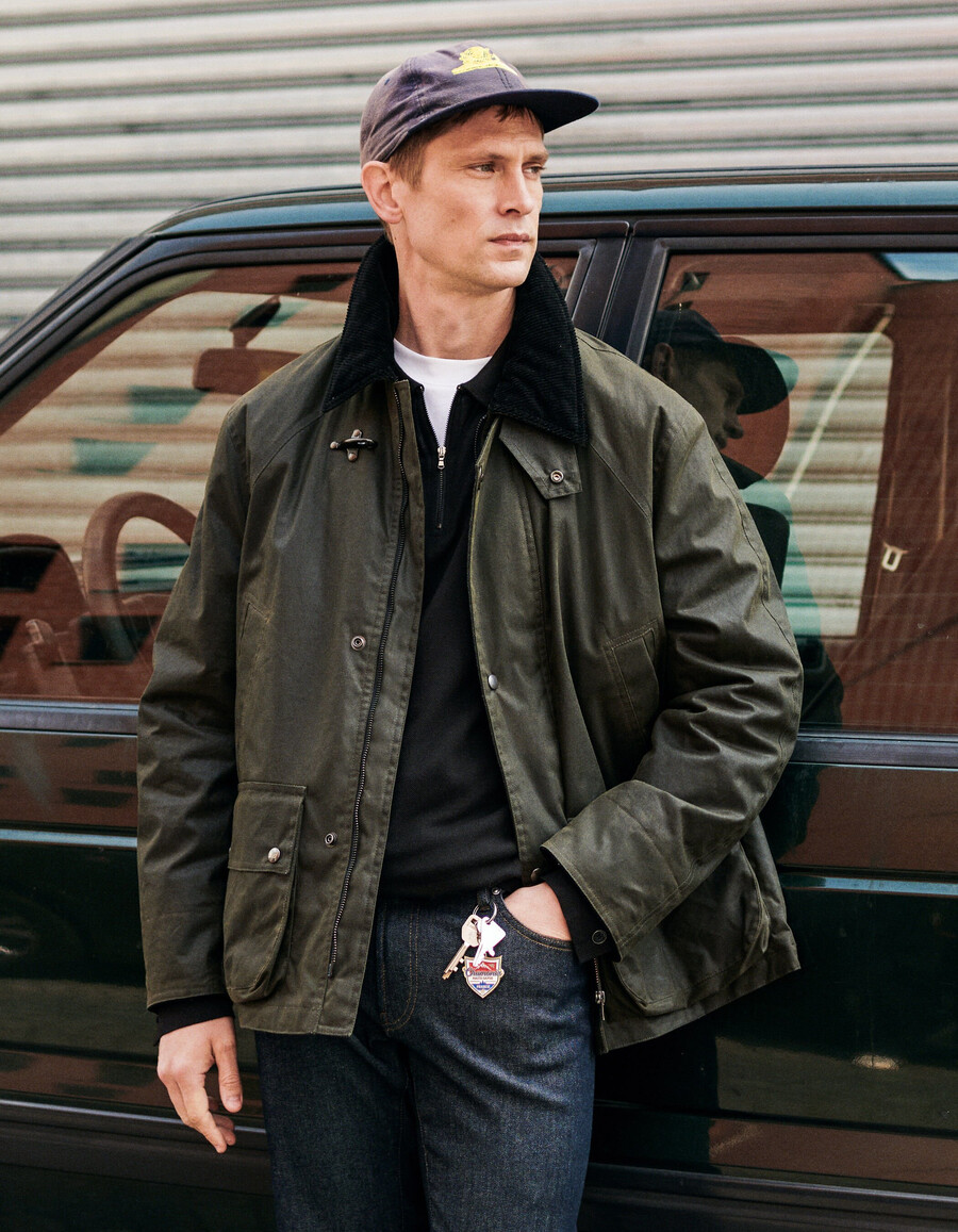 parka de tela encerada con múltiples bolsillos para hombre