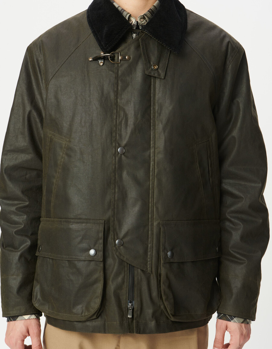 parka de tela encerada con múltiples bolsillos para hombre