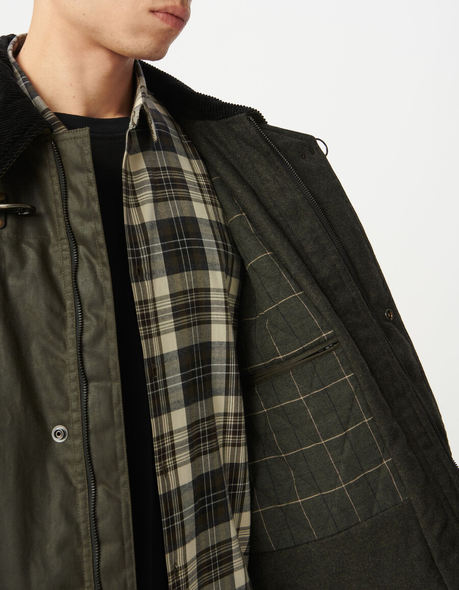parka de tela encerada con múltiples bolsillos para hombre