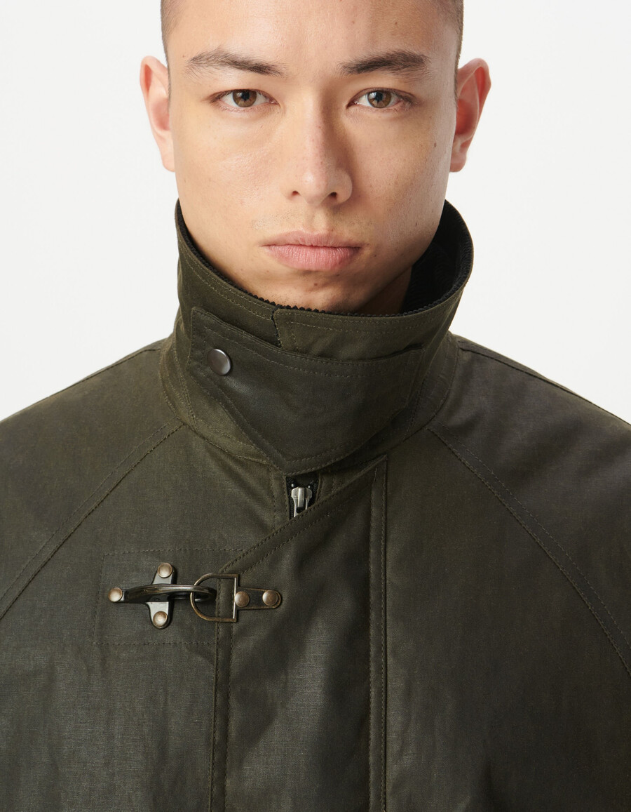 parka de tela encerada con múltiples bolsillos para hombre