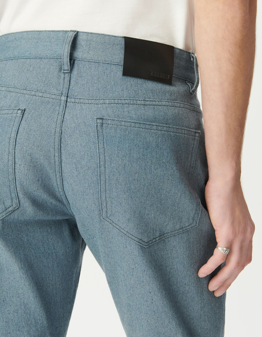 vaqueros ben cónicos de color azul jaspeado para hombre