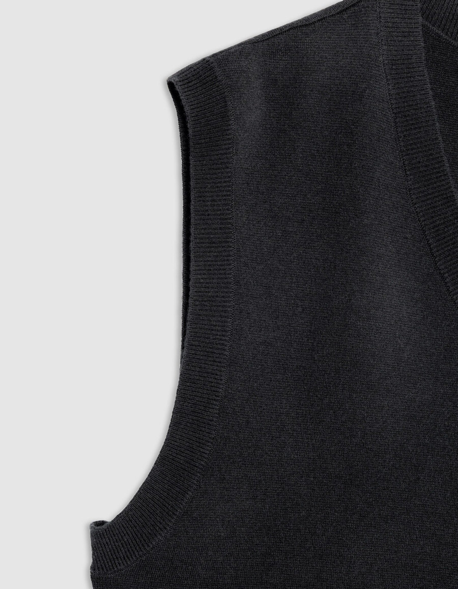 suéter de punto negro sin mangas con cuello en v para hombre