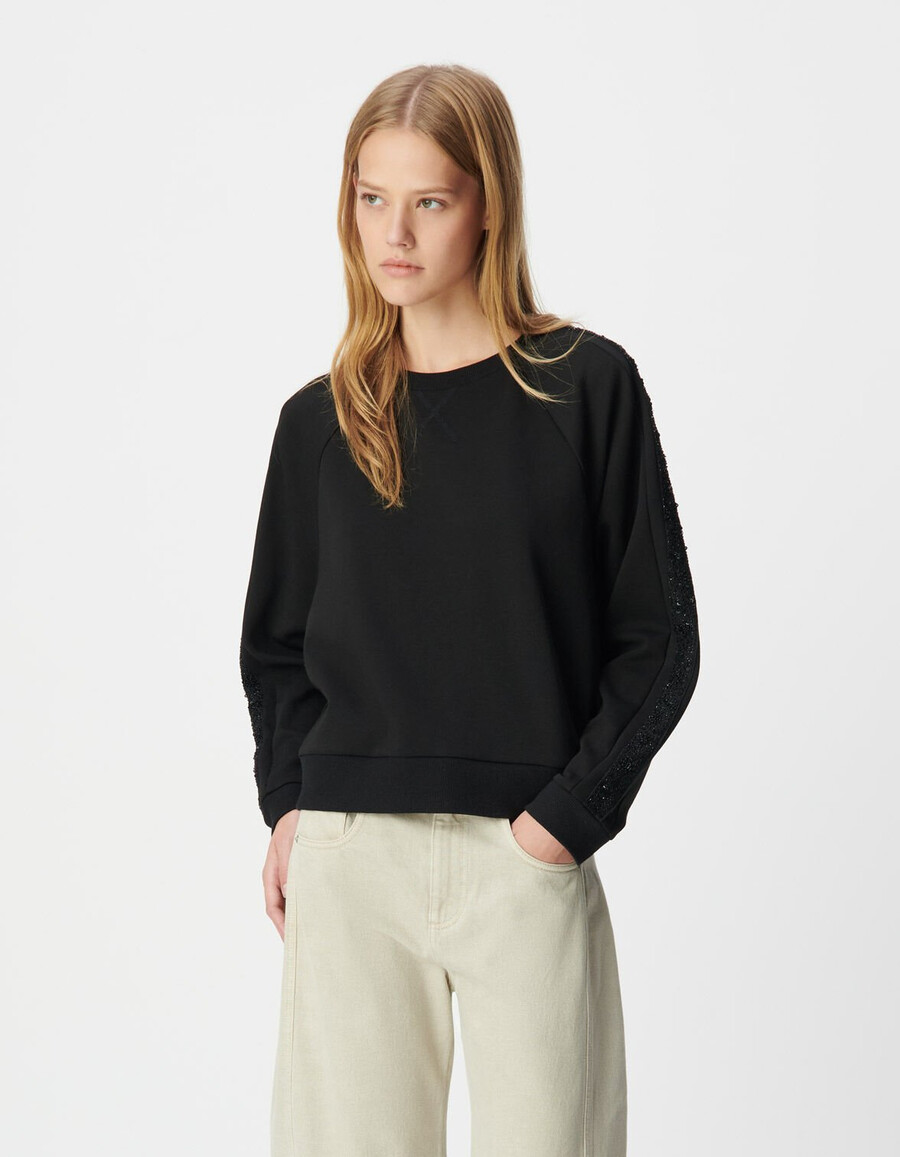sudadera negra de gran tamaño para mujer con mangas abullonadas