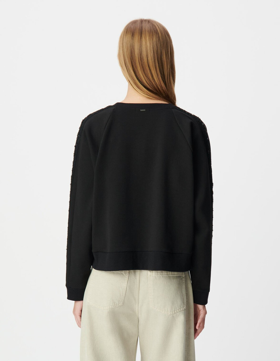 sudadera negra de gran tamaño para mujer con mangas abullonadas