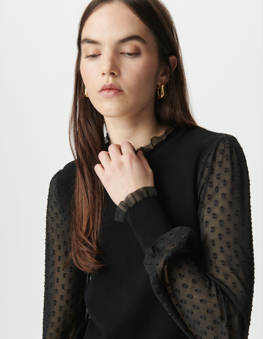 suéter de punto negro para mujer con mangas de voile suizo con lunares