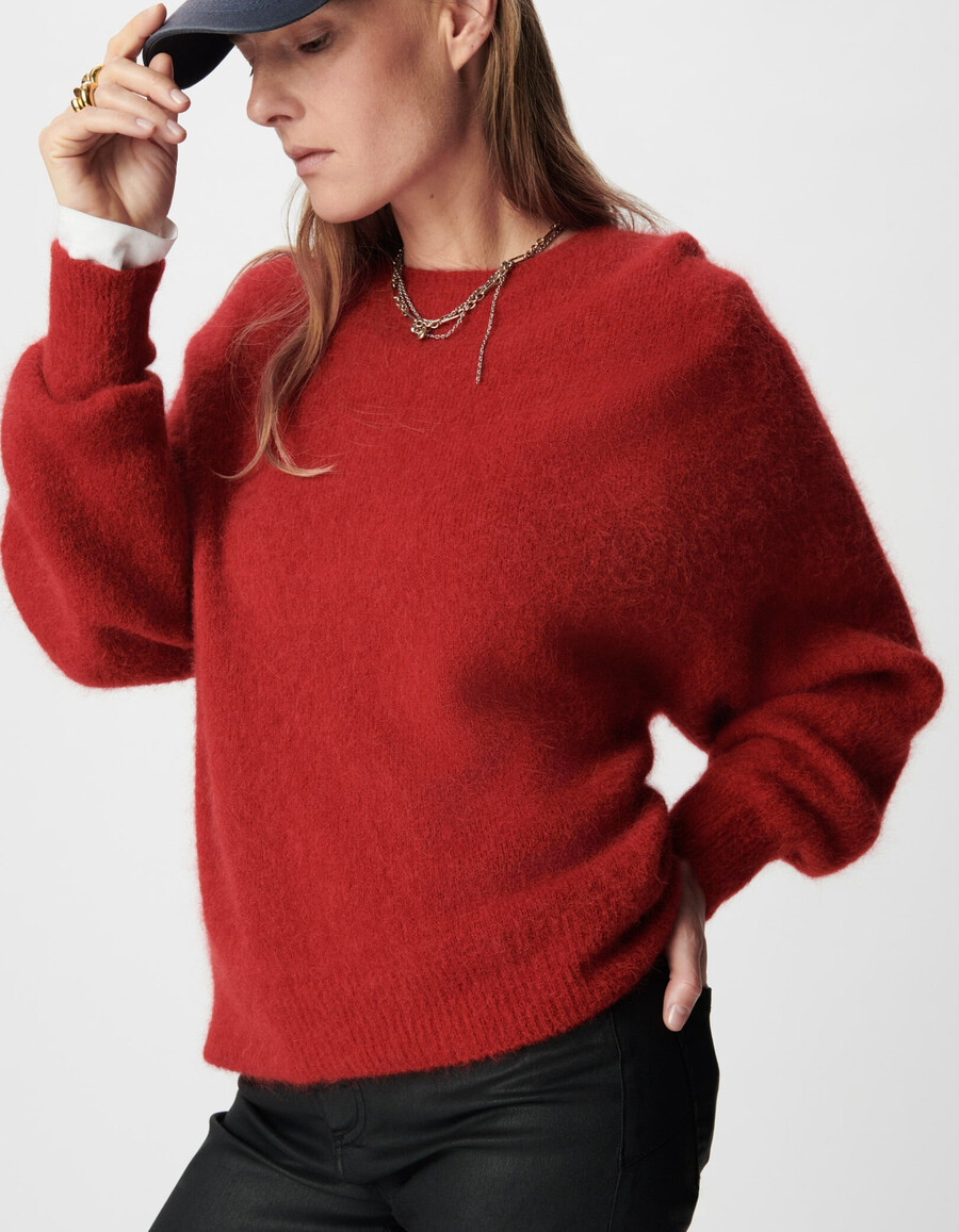 suéter de punto rojo con mangas de murciélago para mujer