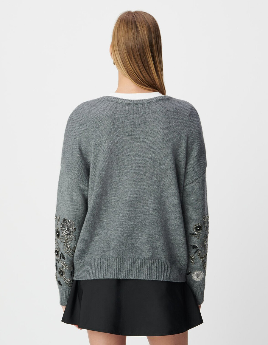 suéter de punto gris jaspeado con detalles de joya para mujer
